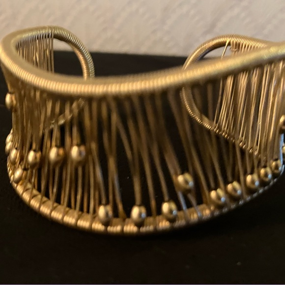 Designer gold bracelet balls move up and down the bracelet with wrist. - Picture 4 of 6